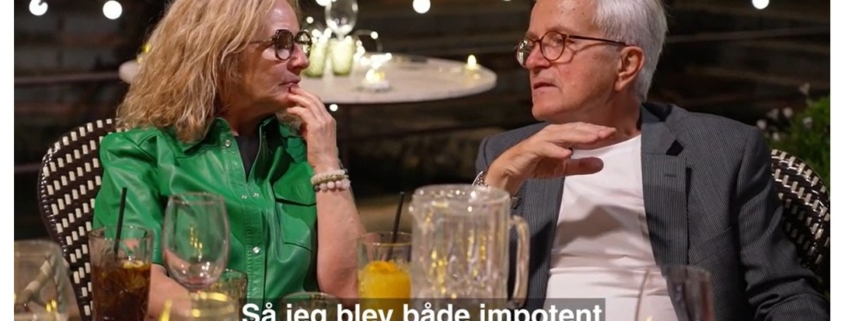 Foto af Tom, der snakker med anden deltager